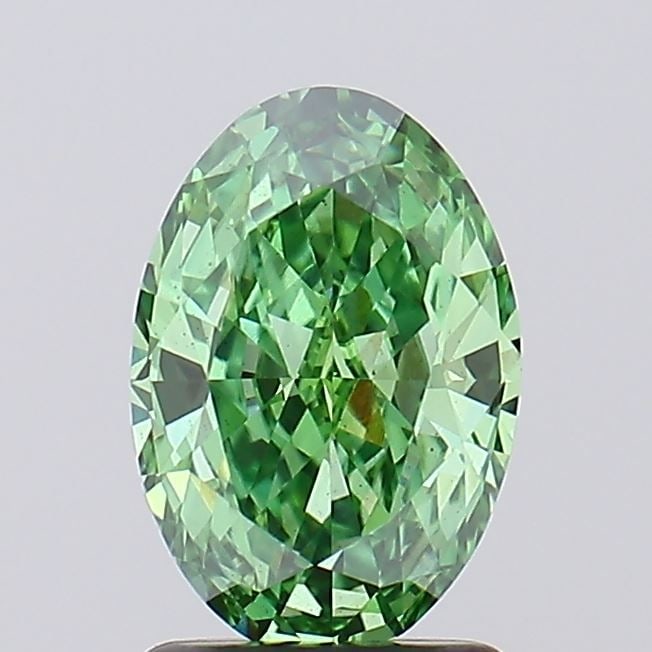 Loose Lab Diamond IGI Oval 1.28ct Fancy Vivid Green VS1: Loose Lab Diamond IGI Oval 1.28ct Fancy Vivid Green VS1 Loose Lab Diamond IGI Oval, weighing 1.28ct, has a Fancy Vivid Green color and VS1 clarity, with VG polish and symmetry, measuring 8.96L x 6.13W