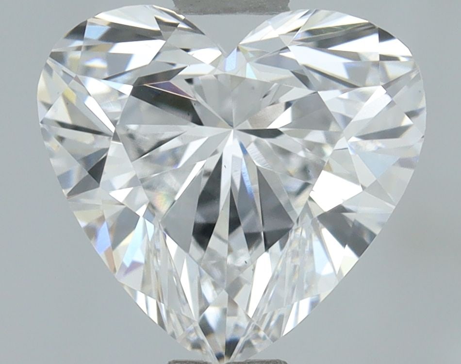 Loose Lab Diamond IGI Heart 1.02ct D VS1: Loose Lab Diamond IGI Heart 1.02ct D VS1 Loose Lab Diamond IGI Heart, weighing 1.02ct, features a D color and VS1 clarity, with EX polish and symmetry, measuring 6.52L x 6.96W x 3.93H. Certified by IG