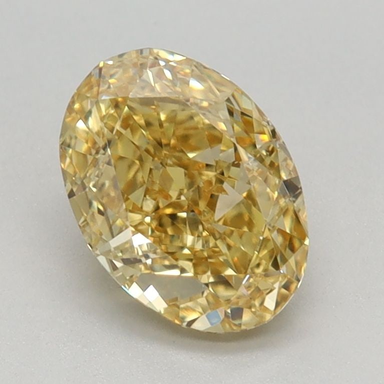 Loose Lab Diamond IGI Oval 1.06ct Fancy Vivid Yellow VS2: Loose Lab Diamond IGI Oval 1.06ct Fancy Vivid Yellow VS2 Loose Lab Diamond IGI Oval 1.06ct with a Fancy Vivid Yellow color and VS2 clarity, featuring VG polish and symmetry, with measurements of 7.35L