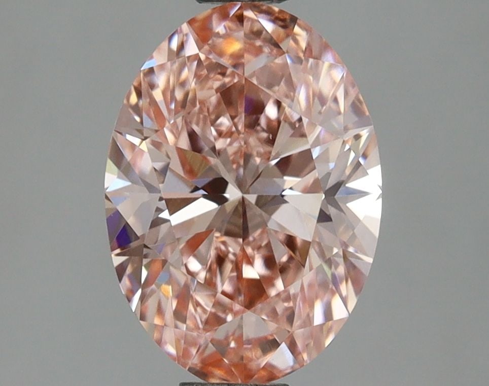 Loose Lab Diamond 1.57ct Fancy Vivid Pink VVS2 - IGI Oval: Loose Lab Diamond 1.57ct Fancy Vivid Pink VVS2 - IGI Oval Loose Lab Diamond 1.57ct in Fancy Vivid Pink color, VVS2 clarity, with EX polish and symmetry, measuring 9.06L x 6.55W x 4.14H. Item