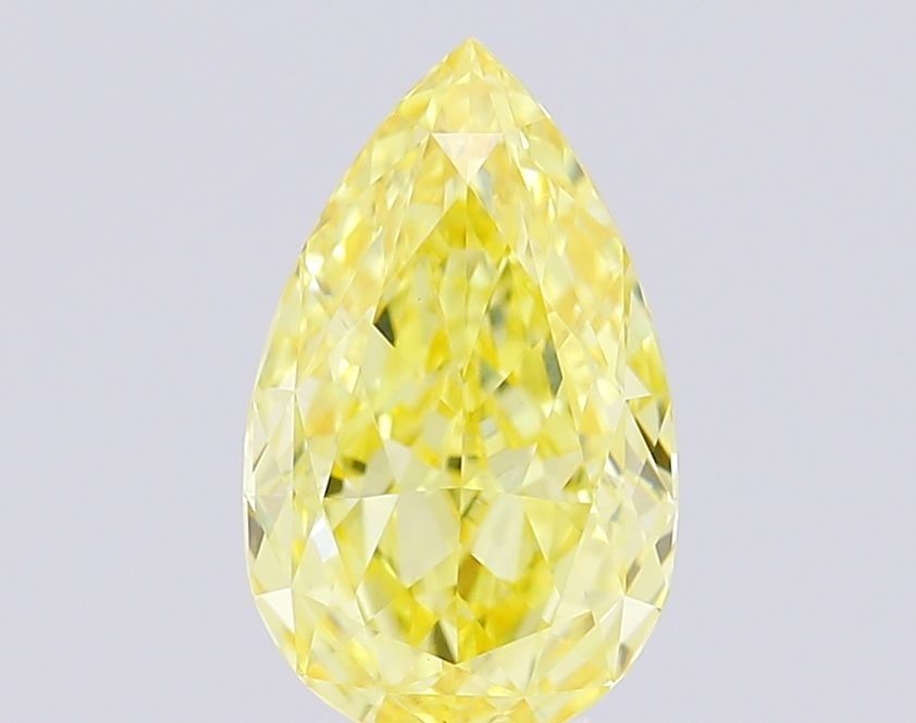 Loose Lab Diamond IGI Pear 1.17ct Fancy Intense Yellow VVS2: Loose Lab Diamond IGI Pear 1.17ct Fancy Intense Yellow VVS2 Loose Lab Diamond IGI Pear 1.17ct Fancy Intense Yellow VVS2, measuring 9.06L x 5.52W x 3.28H, with Polish EX and Symmetry VG. Certified by I