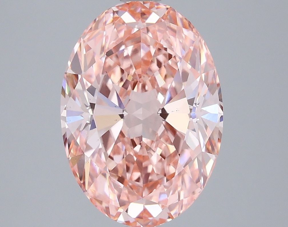 Loose Lab Diamond IGI Oval 3.51ct Fancy Vivid Pink VS2: Loose Lab Diamond IGI Oval 3.51ct Fancy Vivid Pink VS2 This 3.51ct IGI-certified loose lab diamond has an oval shape, fancy vivid pink color, and VS2 clarity, showcasing excellent polish and symmetry.