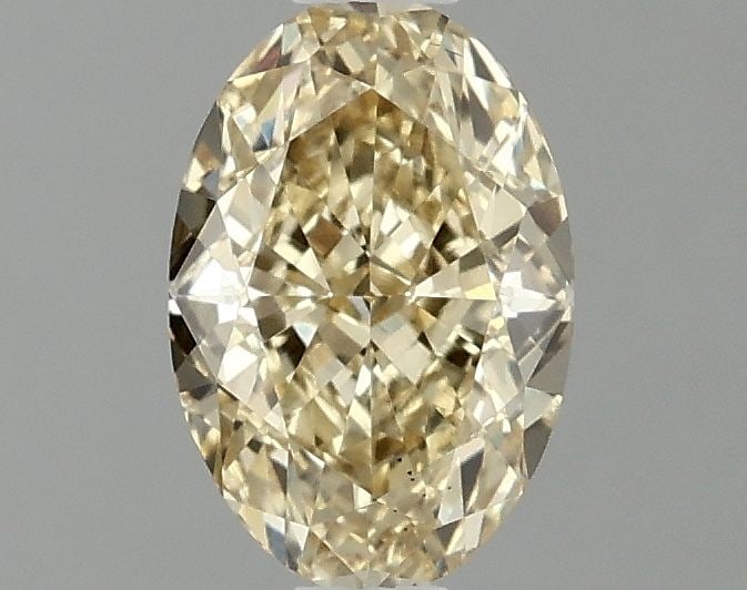 Loose Lab Diamond Oval 1.08ct Fancy Yellow VS2: Loose Lab Diamond Oval 1.08ct Fancy Yellow VS2 Loose Lab Diamond Oval 1.08ct in Fancy Yellow with VS2 clarity. It has excellent polish and symmetry, measuring 7.7L x 5.23W x 3.47H and is not certified
