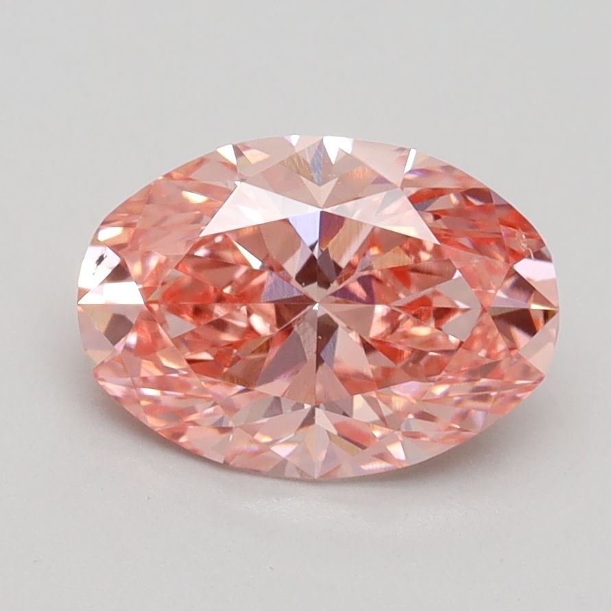 Loose Lab Diamond IGI Oval 1.71ct Fancy Vivid Pink VS2: Loose Lab Diamond IGI Oval 1.71ct Fancy Vivid Pink VS2 Loose Lab Diamond certified by IGI, weighing 1.71ct, features an Oval cut, Fancy Vivid Pink color, and VS2 clarity. Measurements are 9.37L x 6.66