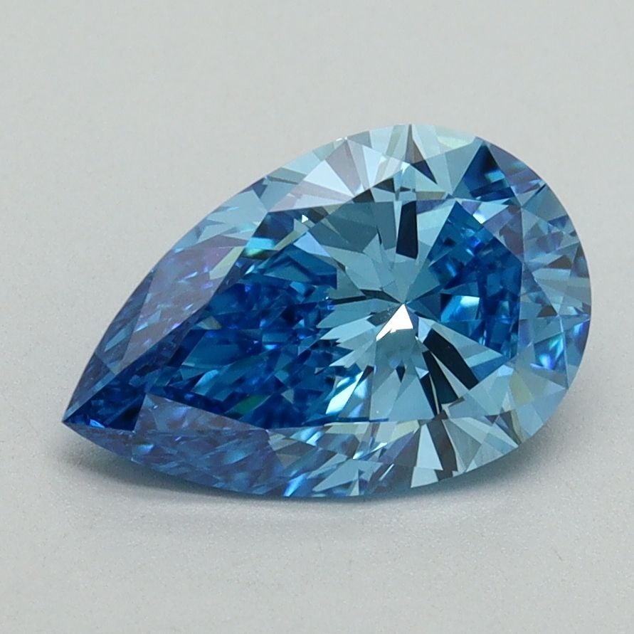 Loose Lab Diamond IGI Pear 1.64ct Fancy Vivid Blue VVS2: Loose Lab Diamond IGI Pear 1.64ct Fancy Vivid Blue VVS2 A 1.64ct loose lab-grown diamond in the shape of a pear, colored Fancy Vivid Blue with VVS2 clarity, measuring 10.39L x 6.73W x 3.97H, certified
