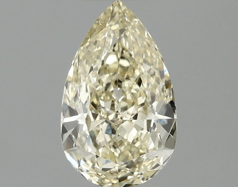 Loose Lab Diamond Pear 1.03ct Fancy Yellow VS1: Loose Lab Diamond Pear 1.03ct Fancy Yellow VS1 Loose Lab Diamond, Pear cut, 1.03ct, Fancy Yellow color, VS1 clarity, Excellent polish, Very Good symmetry, measurements 8.38L x 5.17W x 3.36H. Item Spec