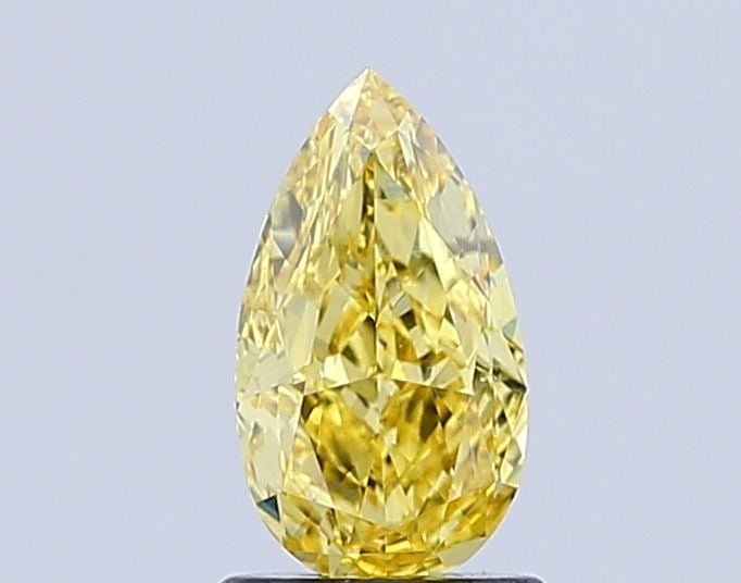 Loose Lab Diamond IGI Pear 1.2ct Fancy Vivid Yellow VS1: Loose Lab Diamond IGI Pear 1.2ct Fancy Vivid Yellow VS1 Loose Lab Diamond IGI Pear 1.2ct in Fancy Vivid Yellow color with VS1 clarity. It boasts Excellent polish and symmetry, measuring 9.06L x 5.07W