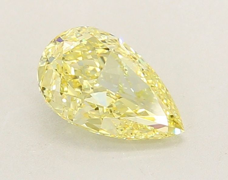 Loose Lab Diamond IGI Pear 1.26ct Fancy Intense Yellow VVS2: Loose Lab Diamond IGI Pear 1.26ct Fancy Intense Yellow VVS2 Loose Lab Diamond IGI Pear, 1.26ct, Fancy Intense Yellow, VVS2 clarity, with EX polish and symmetry, measures 8.96L x 5.5W x 3.47H, certifie