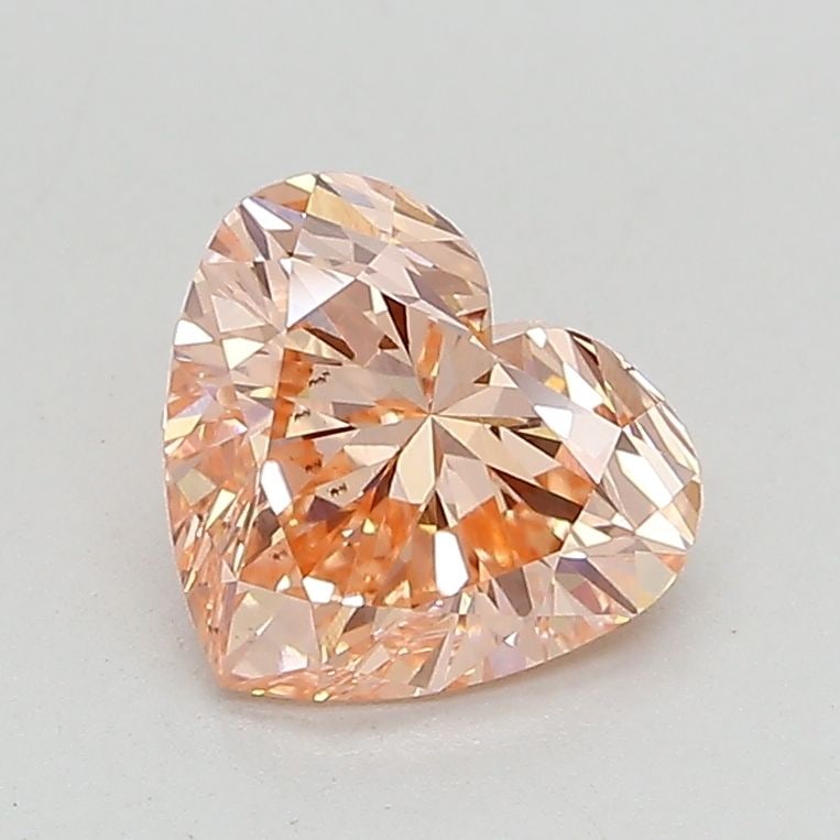 Loose Lab Diamond IGI Heart 1.41ct Fancy Vivid Pink VS2: Loose Lab Diamond IGI Heart 1.41ct Fancy Vivid Pink VS2 Loose lab-grown diamond with a carat weight of 1.41ct, featuring a heart shape, fancy vivid pink color, and VS2 clarity. Certified by IGI, it me