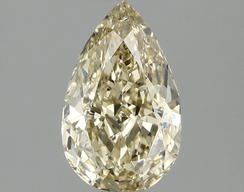 1.09ct Pear Fancy Yellow VVS2 - Loose Lab Diamond: 1.09ct Pear Fancy Yellow VVS2 - Loose Lab Diamond 1.09ct Pear lab diamond with Fancy Yellow color and VVS2 clarity, excellent polish and symmetry; not certified, measuring 8.63L x 5.33W x 3.34H. Item