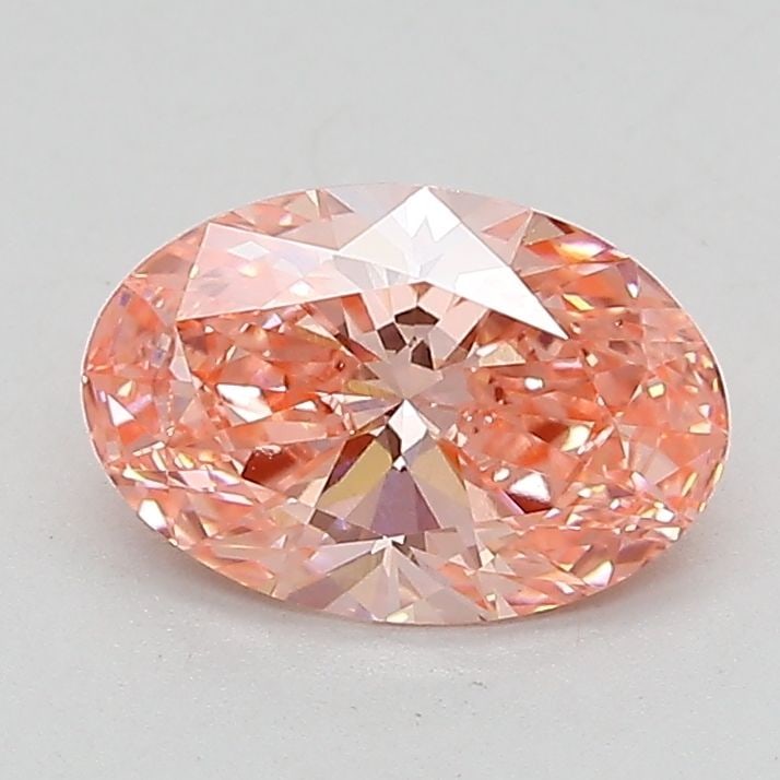 Loose Lab Diamond 1.19ct Fancy Vivid Pink VS1 - IGI Oval: Loose Lab Diamond 1.19ct Fancy Vivid Pink VS1 - IGI Oval Loose Lab Diamond measuring 1.19ct, oval cut, fancy vivid pink color, VS1 clarity, certified by IGI, with excellent polish and symmetry. Item S