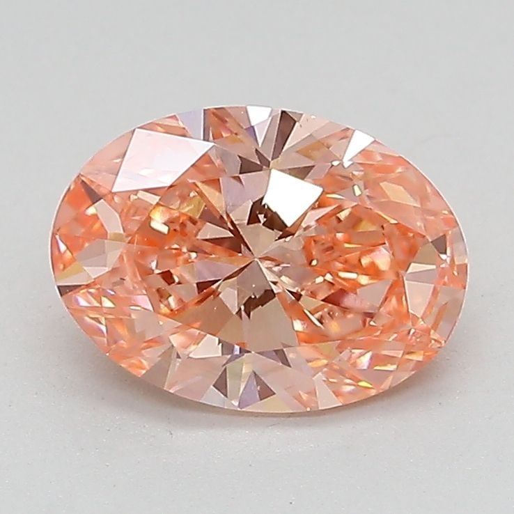 Loose Lab Diamond IGI 1.5ct Oval Fancy Vivid Pink VS2: Loose Lab Diamond IGI 1.5ct Oval Fancy Vivid Pink VS2 Loose lab-grown diamond IGI certified at 1.5ct, featuring a Fancy Vivid Pink color and VS2 clarity. It measures 8.86L x 6.44W x 4.07H, with excell
