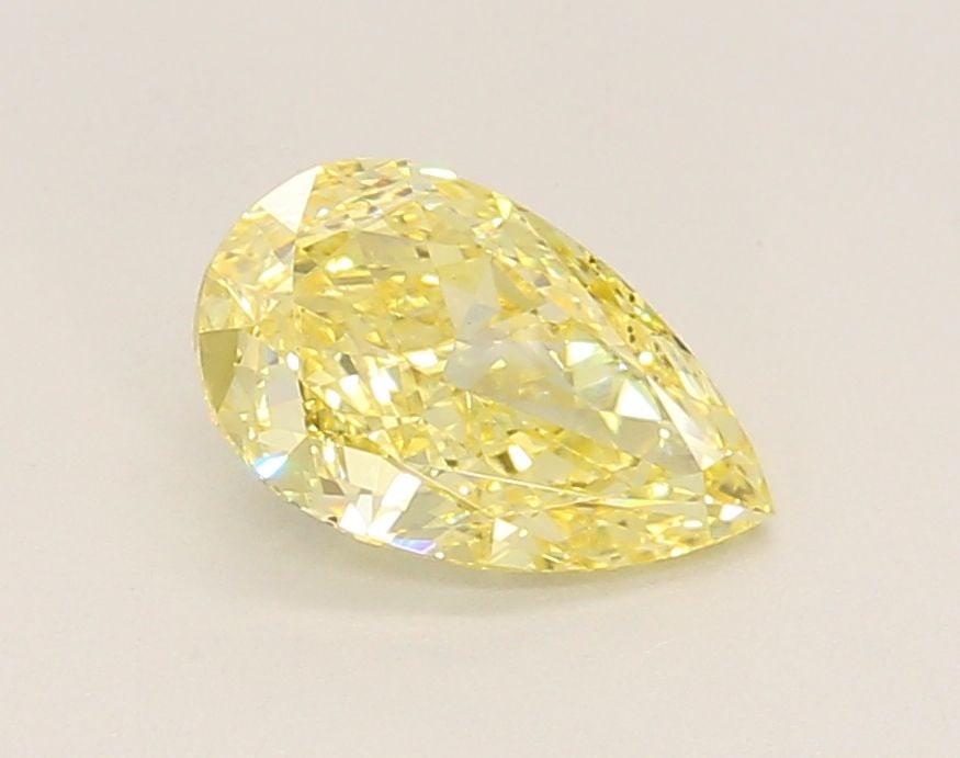 Loose Lab Diamond 1.17ct IGI Pear Fancy Intense Yellow VS2: Loose Lab Diamond 1.17ct IGI Pear Fancy Intense Yellow VS2 Loose lab diamond weighing 1.17ct in a pear cut, featuring a fancy intense yellow color and clarity VS2, certified by IGI. Measurements are 9