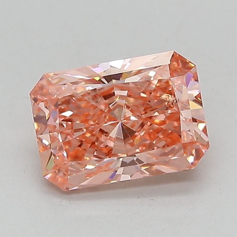 IGI 1.54ct Radiant Fancy Vivid Pink SI1 - Loose Lab Diamond: IGI 1.54ct Radiant Fancy Vivid Pink SI1 - Loose Lab Diamond IGI certified 1.54ct loose lab diamond in radiant cut, color Fancy Vivid Pink, and clarity SI1, featuring excellent polish and symmetry, mea