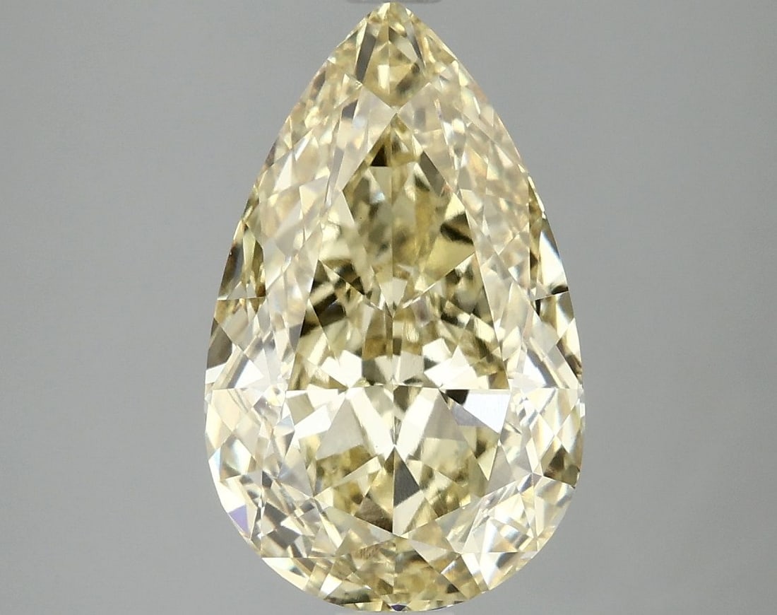 IGI 4.1ct Pear Fancy Intense Yellow VVS2 - Loose Lab Diamond: IGI 4.1ct Pear Fancy Intense Yellow VVS2 - Loose Lab Diamond Loose lab-grown diamond weighing 4.1 carats, shaped as a pear, with fancy intense yellow color and VVS2 clarity, certified by IGI. Item Spe