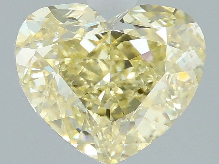 Loose Lab Diamond 2.5ct Fancy Yellow VS1 - IGI Heart: Loose Lab Diamond 2.5ct Fancy Yellow VS1 - IGI Heart Loose lab-grown diamond of 2.5ct, Fancy Yellow color, VS1 clarity, IGI certified, with excellent polish and symmetry, measuring 7.36 x 8.65 x 4.96