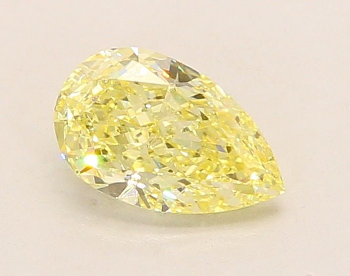 Loose Lab Diamond IGI Pear 1.09ct Fancy Yellow VVS2: Loose Lab Diamond IGI Pear 1.09ct Fancy Yellow VVS2 This Loose Lab Diamond IGI Pear weighs 1.09ct with a Fancy Yellow color and VVS2 clarity. It boasts excellent polish and symmetry, measuring 8.36L x