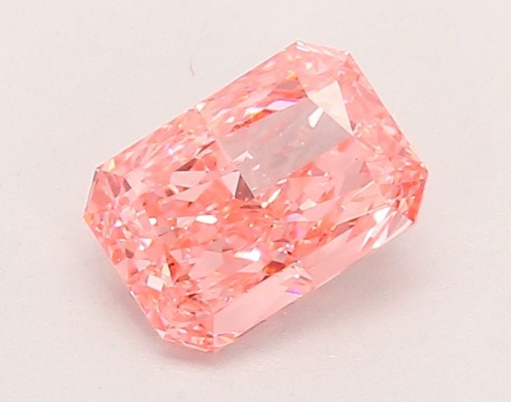 Loose Lab Diamond IGI Radiant 1.17ct Fancy Vivid Pink VS1: Loose Lab Diamond IGI Radiant 1.17ct Fancy Vivid Pink VS1 Loose Lab Diamond weighing 1.17ct, with a radiant cut, fancy vivid pink color, VS1 clarity, and IGI certification. Measurements are 7.13L x