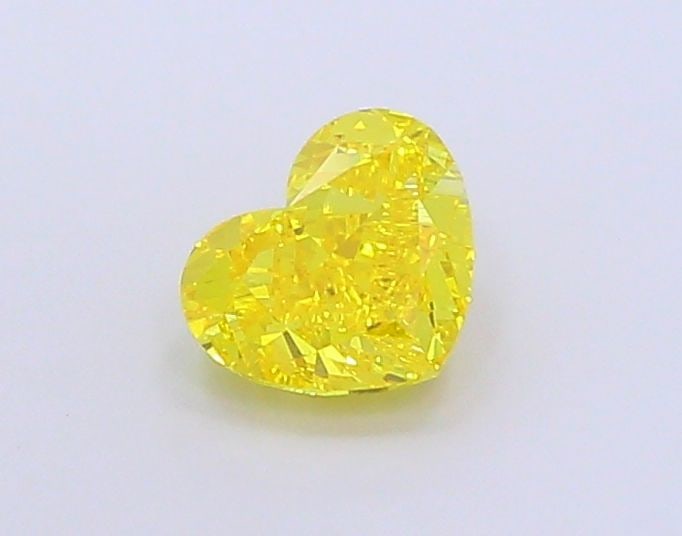 Loose Lab Diamond IGI Heart 2.03ct Fancy Vivid Yellow VS1: Loose Lab Diamond IGI Heart 2.03ct Fancy Vivid Yellow VS1 Loose lab-grown diamond weighing 2.03 ct with a fancy vivid yellow color and VS1 clarity, certified by IGI; dimensions are 6.73L x 8.18W x 4.6