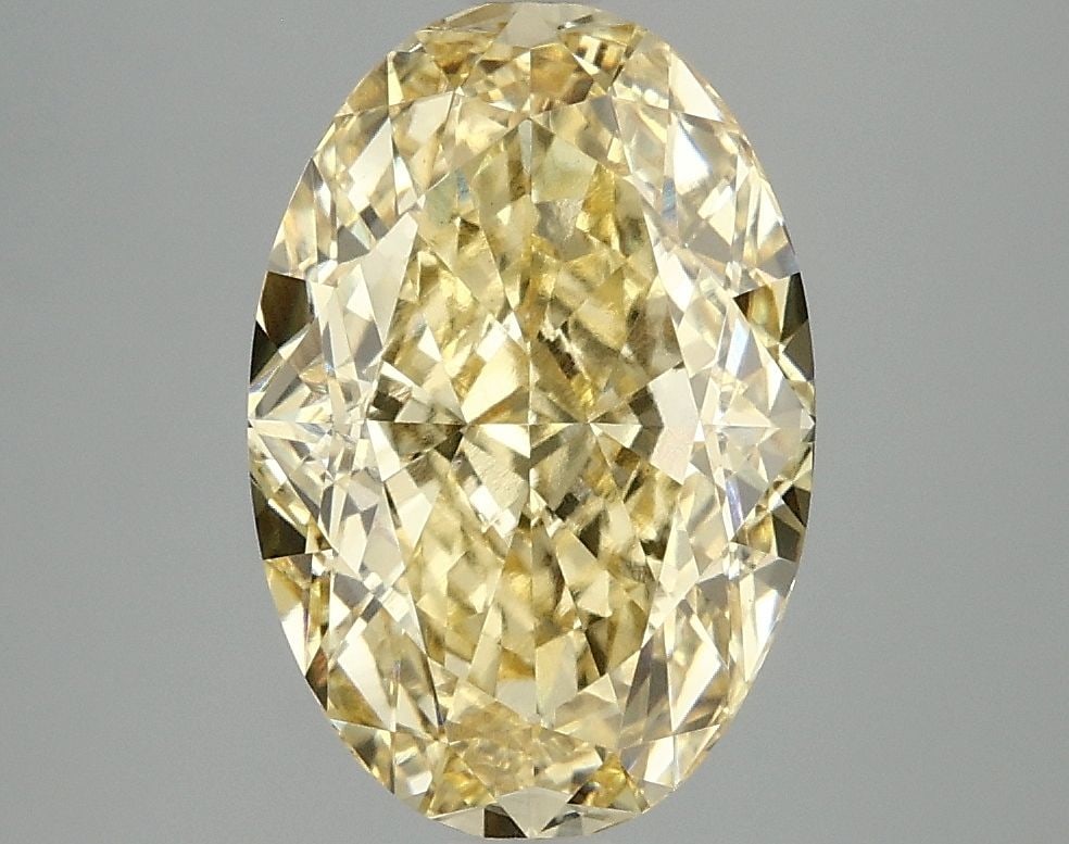 Loose Lab Diamond IGI Oval 4.05ct Fancy Vivid Yellow VVS2: Loose Lab Diamond IGI Oval 4.05ct Fancy Vivid Yellow VVS2 Loose lab-created oval diamond weighing 4.05ct with IGI certification, fancy vivid yellow color, clarity VVS2, and excellent polish and symmet