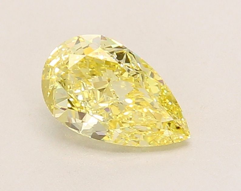 Loose Lab Diamond IGI Pear 1.08ct Fancy Intense Yellow VS1: Loose Lab Diamond IGI Pear 1.08ct Fancy Intense Yellow VS1 Loose Lab Diamond IGI certified, pear shape, 1.08ct, fancy intense yellow color, clarity VS1, showcasing excellent polish and symmetry,