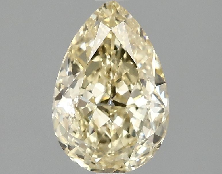 Loose Lab Diamond 1.55ct Fancy Yellow VVS2 - Pear: Loose Lab Diamond 1.55ct Fancy Yellow VVS2 - Pear Loose Lab Diamond, weighing 1.55ct, features a Fancy Yellow color and VVS2 clarity, with excellent polish and symmetry. It measures 9.13L x 6.06W x 3.