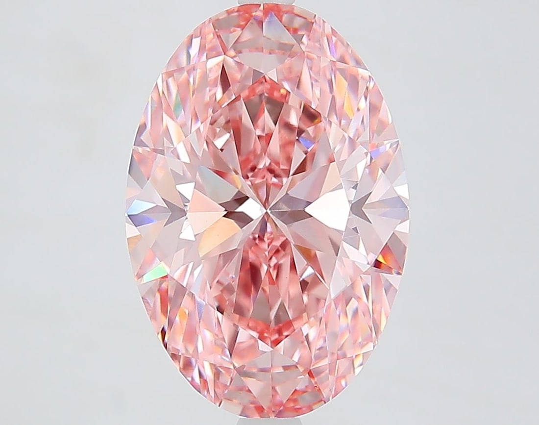 Loose Lab Diamond IGI Oval 4.92ct Fancy Vivid Pink VS1: Loose Lab Diamond IGI Oval 4.92ct Fancy Vivid Pink VS1 This 4.92ct Oval lab-grown diamond features a Fancy Vivid Pink color and VS1 clarity, certified by IGI, with measurements of 13.86L x 9.41W x 5.9