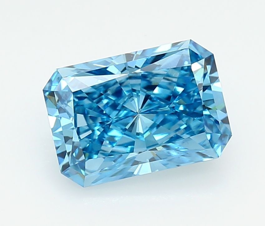 Loose Lab Diamond IGI Radiant 2.11ct Fancy Vivid Blue VS1: Loose Lab Diamond IGI Radiant 2.11ct Fancy Vivid Blue VS1 This Loose Lab Diamond is a 2.11ct radiant with a Fancy Vivid Blue color and VS1 clarity, featuring excellent polish and symmetry, certified b