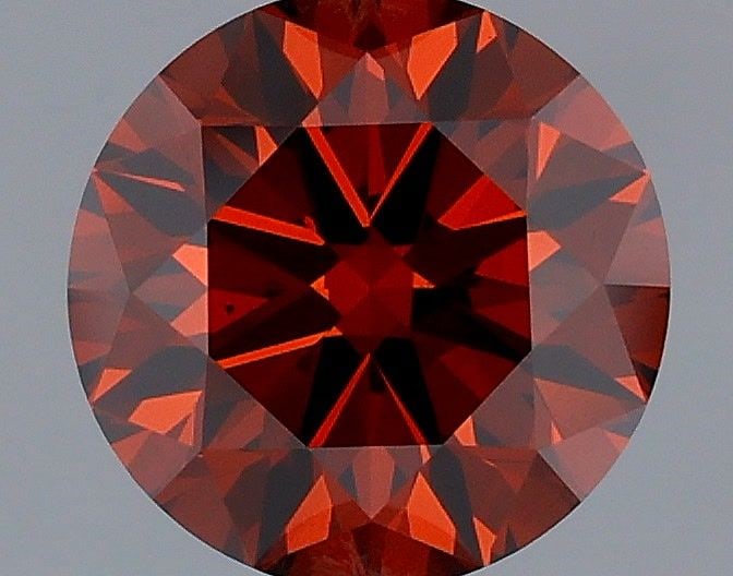 Ideal Loose Lab Diamond IGI Round 1.04ct Fancy Deep Orange VS1: Ideal Loose Lab Diamond IGI Round 1.04ct Fancy Deep Orange VS1 This ideal loose lab-grown diamond is a 1.04ct round cut in Fancy Deep Orange with VS1 clarity, certified by IGI, demonstrating excellent