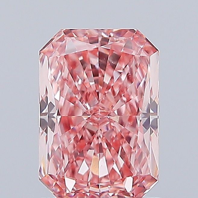 Loose Lab Diamond 1.44ct Fancy Vivid Pink VS1 - IGI Radiant: Loose Lab Diamond 1.44ct Fancy Vivid Pink VS1 - IGI Radiant Loose Lab Diamond weighing 1.44ct in a Radiant cut, with Fancy Vivid Pink color and VS1 clarity, certified by IGI. Measurements are 8.06L x