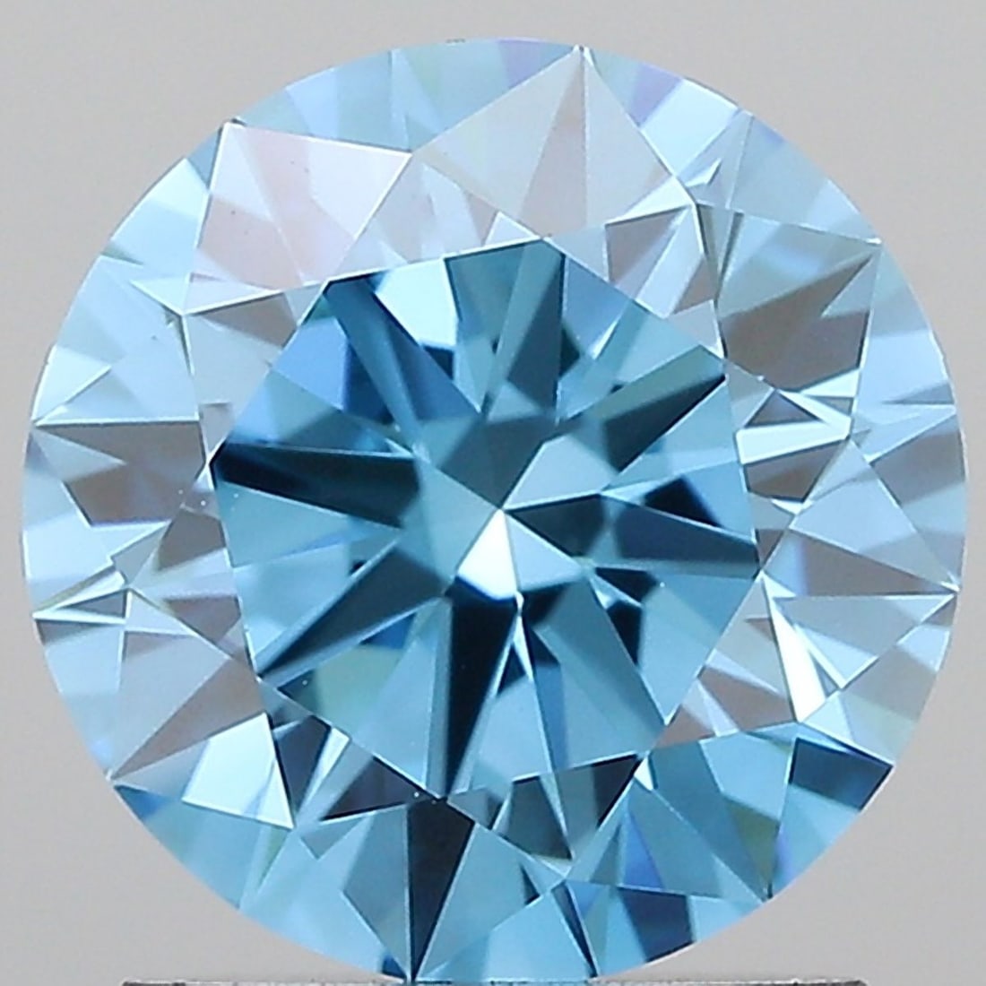 Ideal Loose Lab Diamond 1.52ct Fancy Vivid Blue VVS1 - IGI Round: Ideal Loose Lab Diamond 1.52ct Fancy Vivid Blue VVS1 - IGI Round 1.52ct Ideal Loose Lab Diamond IGI certified, featuring a round cut, Fancy Vivid Blue color, VVS1 clarity, and EX polish and symmetry,
