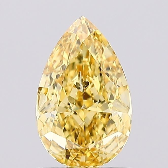 IGI Pear 1.01ct Fancy Vivid Yellow SI1 - Loose Diamond: IGI Pear 1.01ct Fancy Vivid Yellow SI1 - Loose Diamond IGI Pear 1.01ct Loose Diamond in Fancy Vivid Yellow color with SI1 clarity, featuring excellent polish and symmetry, measures 8.26L x 5.17W x 3.3