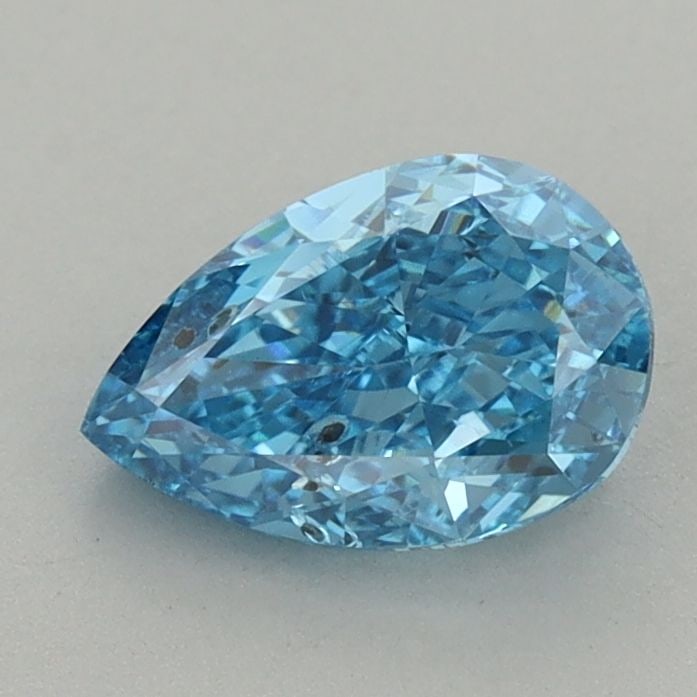 Loose Lab Diamond IGI Pear 1.13ct Fancy Vivid Blue SI2: Loose Lab Diamond IGI Pear 1.13ct Fancy Vivid Blue SI2 Loose Lab Diamond IGI Pear of 1.13ct, featuring a Fancy Vivid Blue color and SI2 clarity, with excellent polish and symmetry. Certified by IGI, d