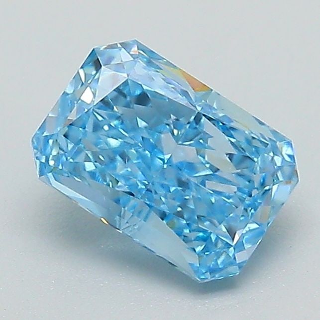 Loose Lab Diamond IGI Radiant 1.1ct Fancy Vivid Blue VS1: Loose Lab Diamond IGI Radiant 1.1ct Fancy Vivid Blue VS1 Loose Lab Diamond IGI Radiant 1.1ct Fancy Vivid Blue VS1, known for its excellent polish and symmetry, with dimensions of 7.01L x 4.87W x 3.37H