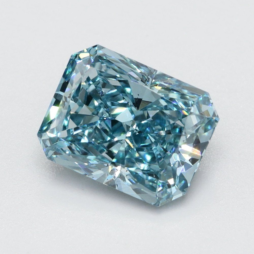 Loose Lab Diamond Radiant 1.03ct Fancy Vivid Blue VS2: Loose Lab Diamond Radiant 1.03ct Fancy Vivid Blue VS2 Loose lab-grown diamond, radiant cut, 1.03ct with Fancy Vivid Blue color and VS2 clarity, measurements 6.5L x 5.0W x 3.45H, no certification. Item
