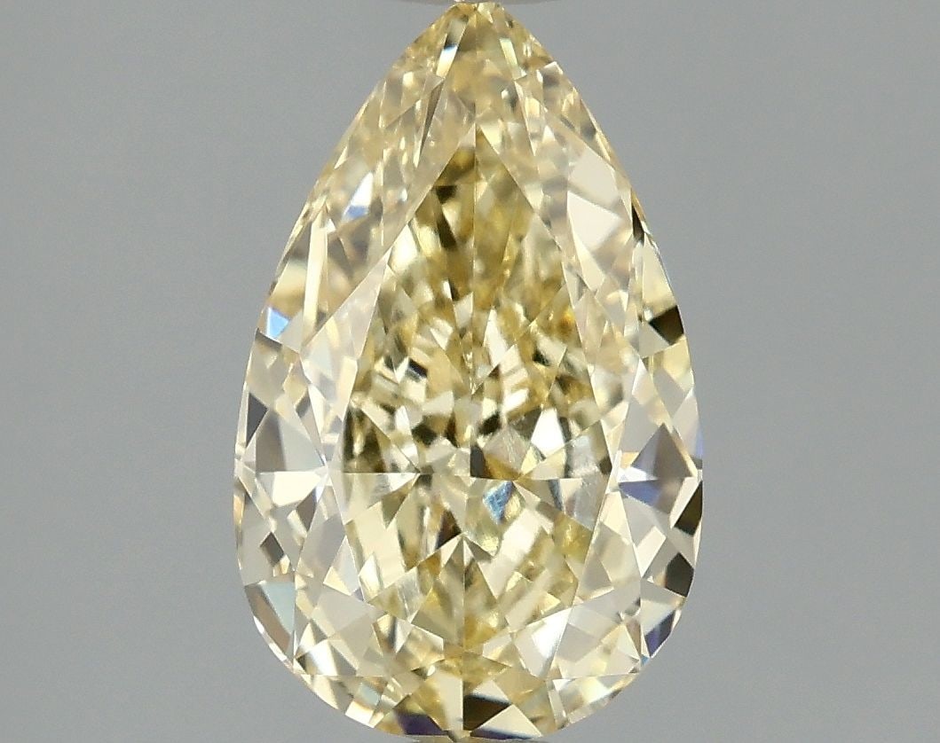 Loose Lab Diamond Pear 1.57ct Fancy Yellow VVS2: Loose Lab Diamond Pear 1.57ct Fancy Yellow VVS2 Loose lab diamond, 1.57ct, pear cut, fancy yellow color, clarity VVS2, not certified, with excellent polish and symmetry, measurements 9.63L x 5.97W x 3