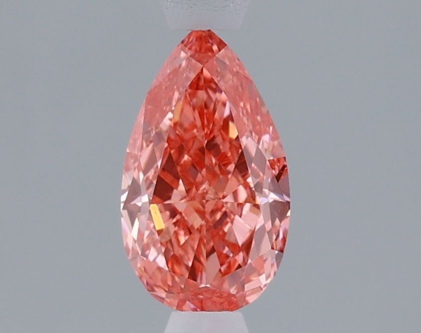 Loose Lab Diamond IGI Pear 1.09ct Fancy Vivid Pink VS1: Loose Lab Diamond IGI Pear 1.09ct Fancy Vivid Pink VS1 Loose Lab Diamond weighing 1.09ct with a pear cut, fancy vivid pink color, VS1 clarity, and certified by IGI; measurements are 8.62L x 5.0W x