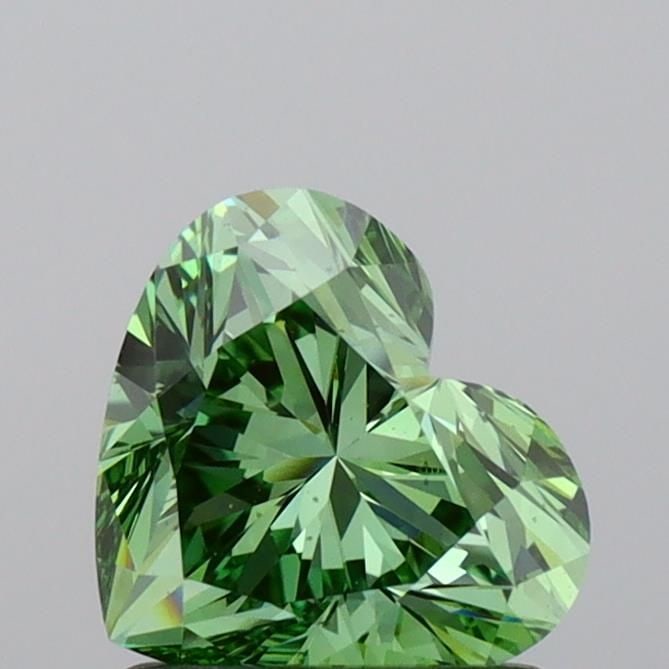 Loose Lab Diamond IGI Heart 1.01ct Fancy Vivid Green VS2: Loose Lab Diamond IGI Heart 1.01ct Fancy Vivid Green VS2 Loose Lab Diamond IGI Heart weighing 1.01ct, featuring a Fancy Vivid Green color and VS2 clarity, with dimensions of 6.07L x 6.97W x 4.13H.