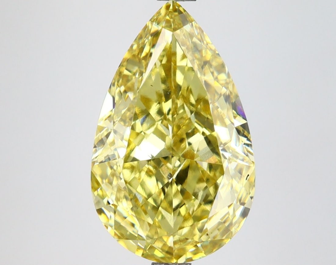 IGI Pear 4.56ct Fancy Vivid Yellow VS1 Loose Lab Diamond: IGI Pear 4.56ct Fancy Vivid Yellow VS1 Loose Lab Diamond IGI certified loose lab diamond weighing 4.56 carats, colored fancy vivid yellow with VS1 clarity and excellent polish and symmetry. Measuremen