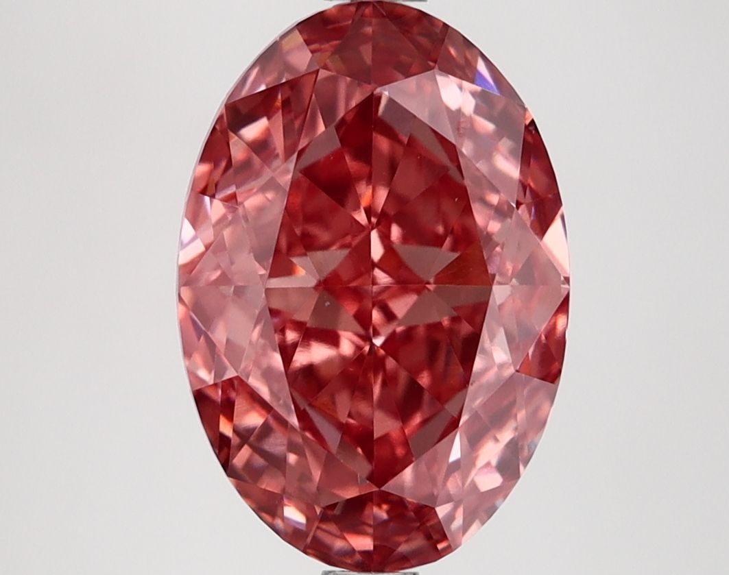 Loose Lab Diamond IGI Oval 3.69ct Fancy Vivid Brownish Pink VVS2: Loose Lab Diamond IGI Oval 3.69ct Fancy Vivid Brownish Pink VVS2 This 3.69ct Loose Lab Diamond features a Fancy Vivid Brownish Pink color and VVS2 clarity, with dimensions of 11.49L x 7.86W x 5.18H,
