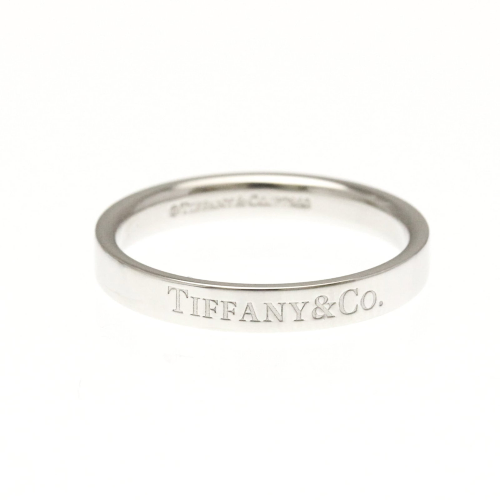 Platinum Tiffany Band Ring: Platinum Tiffany Band Ring Platinum band ring by Tiffany for men and women, in very good used condition, size 8-8.5, weighing 5.8g. Item Specifics: Brand: Tiffany Type: Band Ring Style: Fashion Gender
