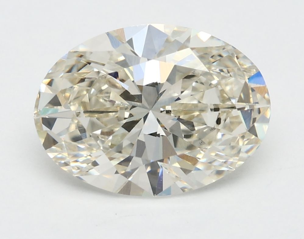 Loose Lab Diamond IGI Oval 2.09ct J VS1: Loose Lab Diamond IGI Oval 2.09ct J VS1 Loose lab-grown diamond IGI certified, weighing 2.09ct with color J and clarity VS1, featuring excellent polish and symmetry, measuring 10.09L x 7.32W x 4.54H.