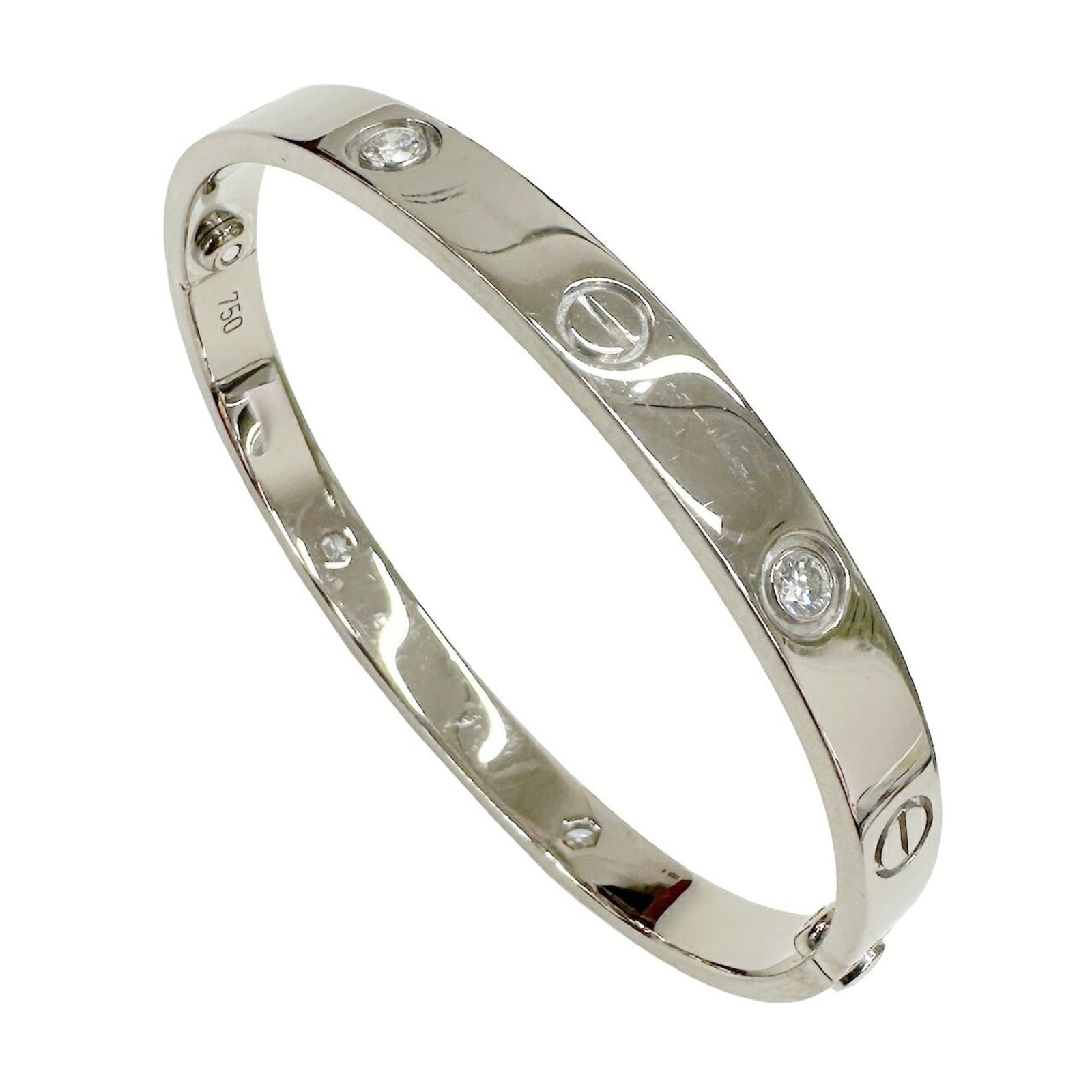 White Gold (18K) Cartier Charm Bracelet: White Gold (18K) Cartier Charm Bracelet The Cartier charm bracelet, made from 18K white gold and featuring diamonds, measures 16.5cm in length and is in good condition with traces of usage. Item Speci