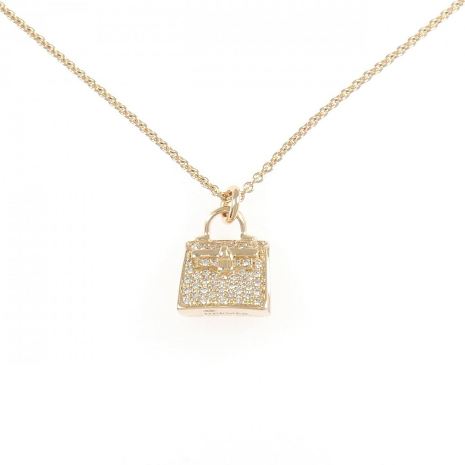 0.21CT Hermes Kelly Necklace: 0.21CT Hermes Kelly Necklace Hermes 0.21ct diamond pendant necklace for women in 18K pink gold, with a neck circumference adjustable from 3.14'' to 1.57'', pendant size 17.5mm x 11.5mm, in like new co