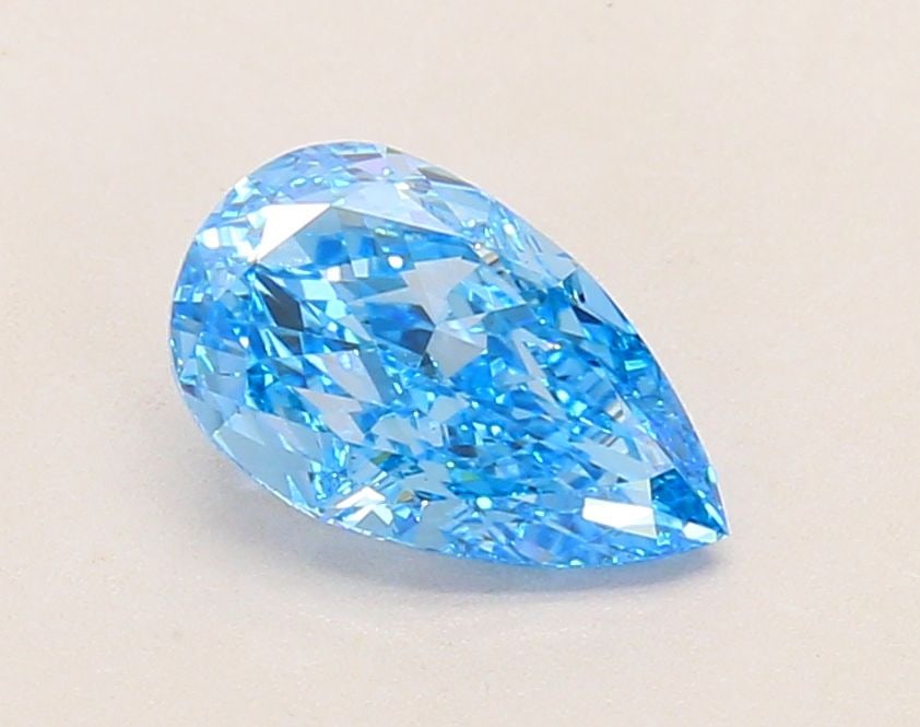 Loose Lab Diamond IGI Pear 1.2ct Fancy Vivid Blue VS1: Loose Lab Diamond IGI Pear 1.2ct Fancy Vivid Blue VS1 Loose lab-grown diamond weighing 1.2ct, with a Fancy Vivid Blue color and VS1 clarity, certified by IGI. The measurements are 8.97L x 5.39W x