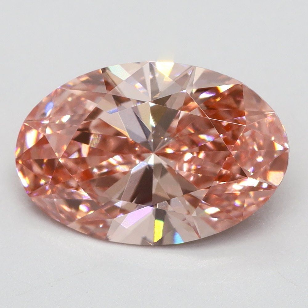 Loose Lab Diamond 1.23ct Fancy Vivid Pink VVS2 - Oval: Loose Lab Diamond 1.23ct Fancy Vivid Pink VVS2 - Oval Loose lab diamond weighing 1.08ct, E color, VS1 clarity, measurements of 7.18L x 4.88W x 3.15H, certified by IGI. Item Specifics: Source: This