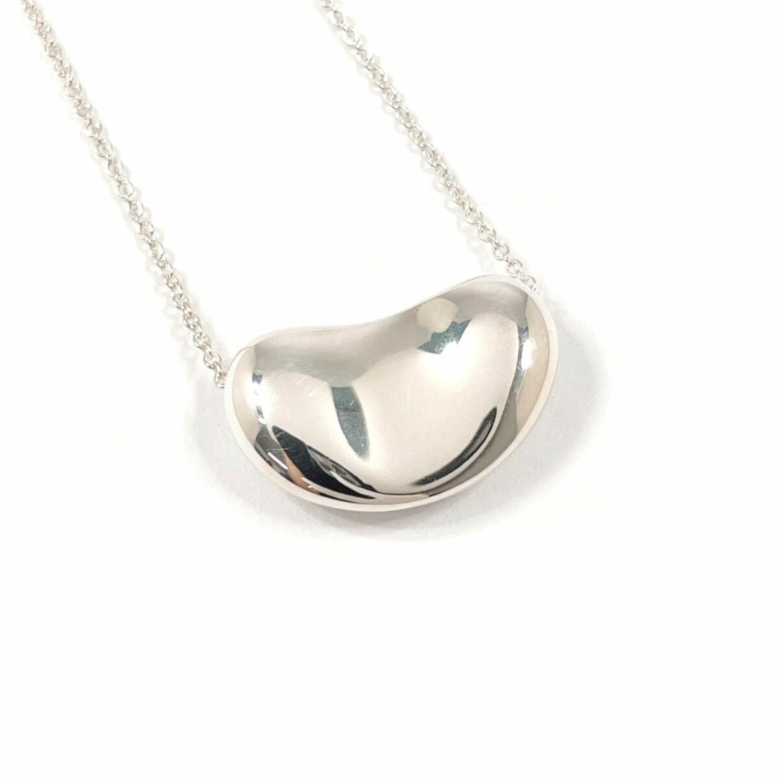 Tiffany & Co. Elsa Peretti Bean Necklace, 925 Sterling Silver for Women: Tiffany & Co. Elsa Peretti Bean Necklace, 925 Sterling Silver for Women Tiffany & Co. Elsa Peretti Bean Necklace, crafted from 925 sterling silver, measuring 40.5 cm in neck circumference and 11.8mm x