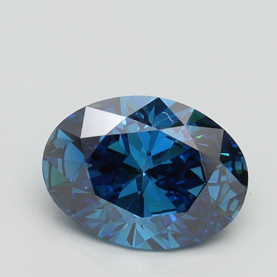 Loose Lab Diamond IGI Oval 1.52ct Fancy Vivid Blue VS2: Loose Lab Diamond IGI Oval 1.52ct Fancy Vivid Blue VS2 Loose lab-grown diamond, IGI certified, weighing 1.52ct with a Fancy Vivid Blue color and VS2 clarity. Measurements are 8.93L x 6.54W x 4.02H. 