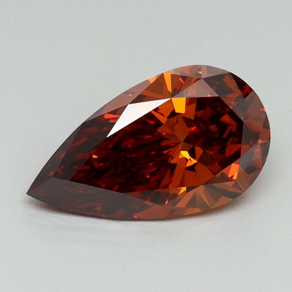 Loose Lab Diamond 1.52ct IGI Pear Fancy Deep Orange VS1: Loose Lab Diamond 1.52ct IGI Pear Fancy Deep Orange VS1 This Loose Lab Diamond weighs 1.52 carats in a Pear cut with a Fancy Deep Orange color and VS1 clarity, certified by IGI, ensuring excellent