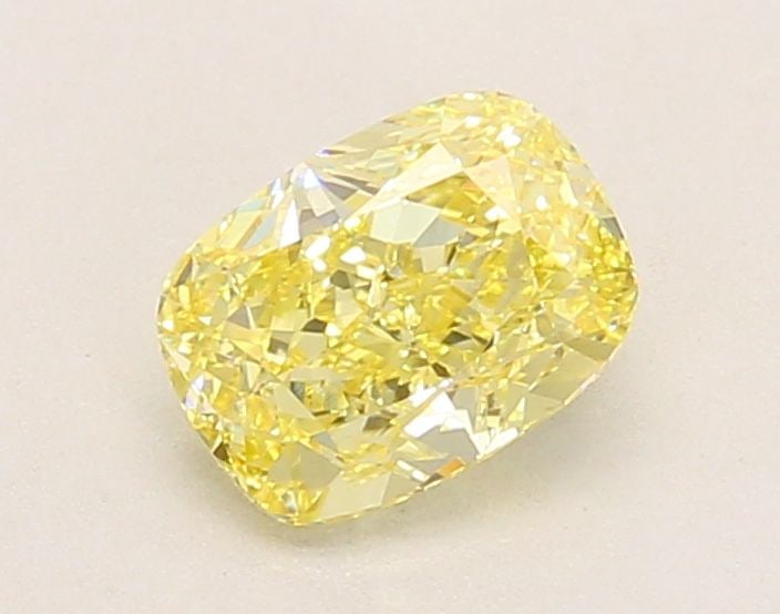 Loose Lab Diamond IGI Cushion Modified 1.06ct Fancy Intense Yellow VVS2: Loose Lab Diamond IGI Cushion Modified 1.06ct Fancy Intense Yellow VVS2 1.06ct Fancy Intense Yellow VVS2 loose lab diamond in cushion modified cut with excellent polish and symmetry, certified by IGI.